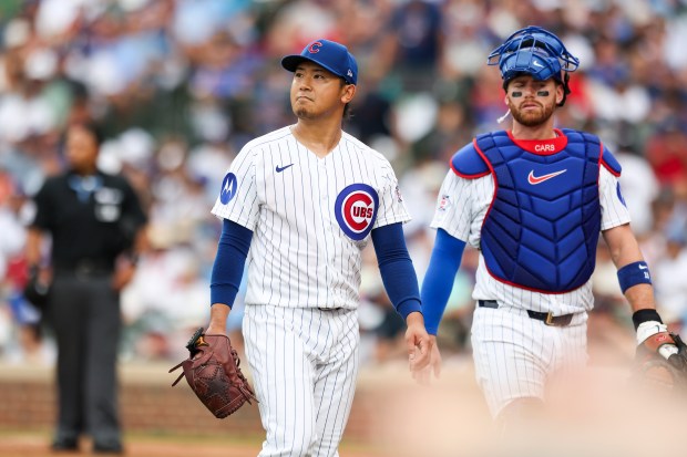 Cubs starter Shota Imanaga, left, and catcher Carson Kelly walk off the field after the top of the fourth inning against the Dodgers on Wednesday, Aug. 5, 2026, at Wrigley Field. (Eileen T. Meslar/Chicago Tribune)
