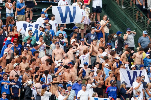 Fans celebrate after the Cubs defeated the Dodgers 7-6 on Wednesday, Aug. 5, 2026, at Wrigley Field. (Eileen T. Meslar/Chicago Tribune)