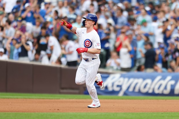 Cubs center fielder Pete Crow-Armstrong celebrates as he rounds the bases after hitting a two-run home run in the fourth inning against the Dodgers on Wednesday, Aug. 5, 2026, at Wrigley Field. (Eileen T. Meslar/Chicago Tribune)