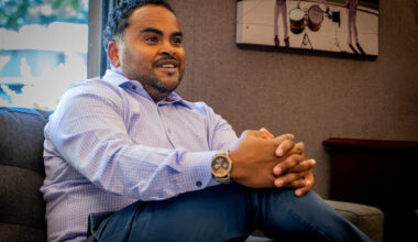 man sitting on couch