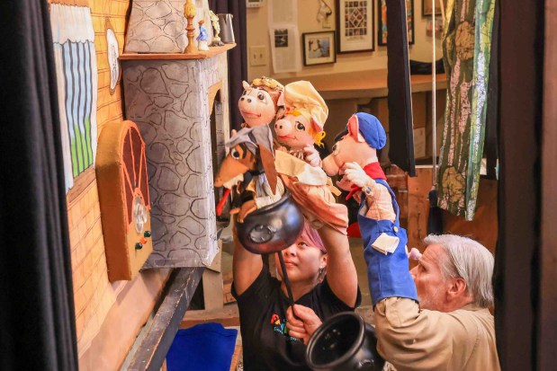 Children's Fairyland puppet theater director Randal Metz, right, and Tasha La, perform "The Three Little Pigs" puppet show during the 70th anniversary of the Storybook Puppet Theater at Children's Fairyland in Oakland, Calif., on Saturday, Aug. 29, 2026. The weekend Puppet Fair featured performances on multiple stages by the San Francisco Bay Area Puppeteers Guild and other artists, a display of historic puppets and hands-on workshops where children made rod puppets. "It's like Coachella for people who love puppets, puppet shows and puppeteers," organizers said. (Ray Chavez/Bay Area News Group)