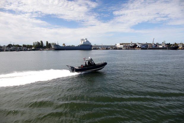 In a view looking west towards Alameda boat passes the inner harbor turning basin along the Port of Oakland on Thursday, Aug. 27, 2026 in Oakland, Calif. The Port of Oakland, and the Army Corps of Engineers have signed a design agreement that formally launches a $640 million infrastructure project to modernize the Port's turning basins. (Aric Crabb/Bay Area News Group)
