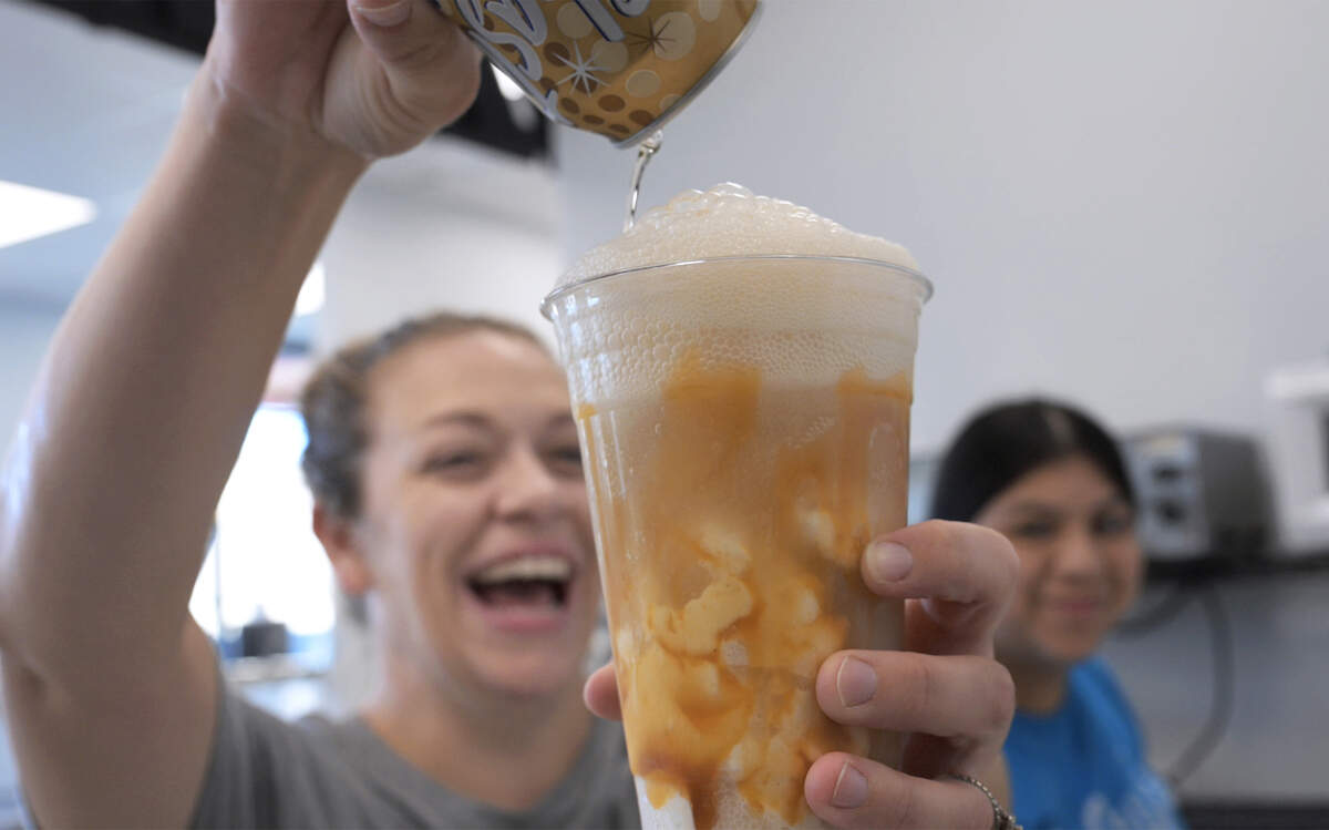Janel Haas pours cream soda into Caramel Apple in a Cup Fizzy Float at Jay’s Specialty Ice Cream which has just opened along Shaw Ave. west of 99. The shop will host its grand opening Saturday, Sept. 27, 2025. Photographed Monday, Sept. 22, 2025 in Fresno.