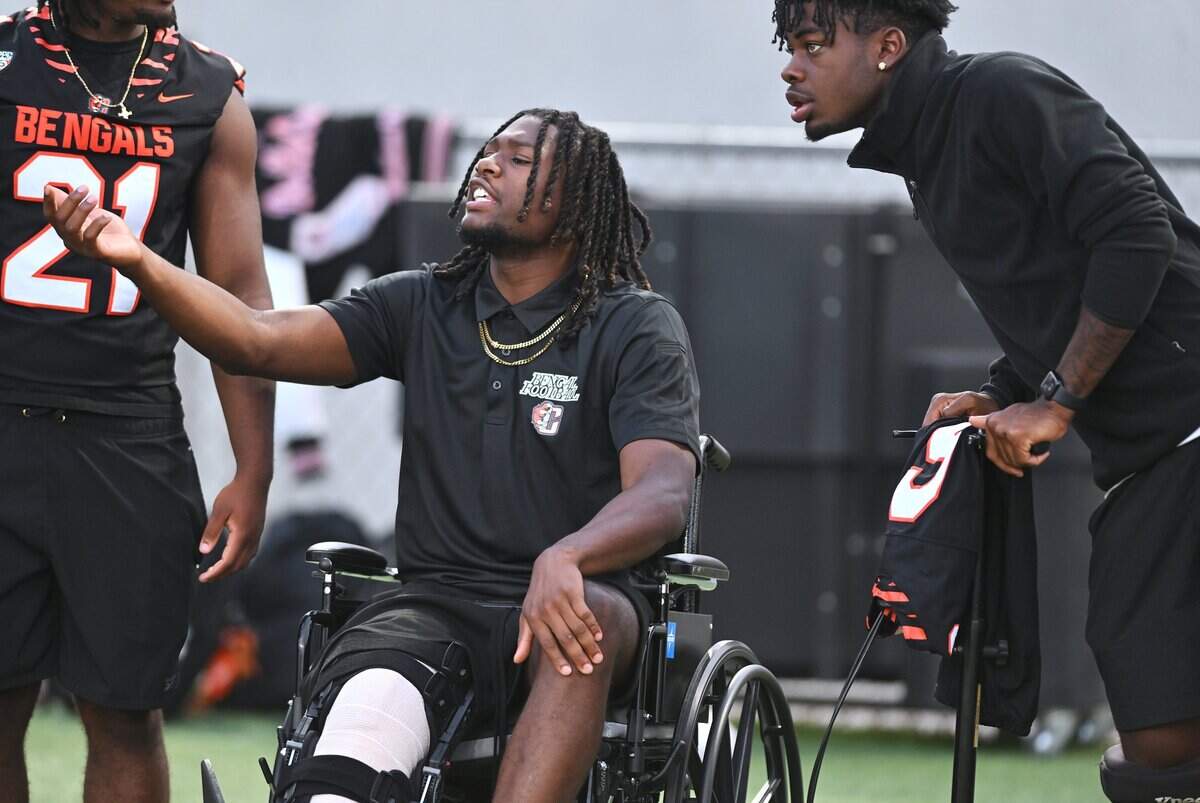 Central East wide receiver Bayon Harris, center, gestures frmo the sideline towards game action against Grant in week 2 action Friday night, Aug. 28, 2026 in Fresno.