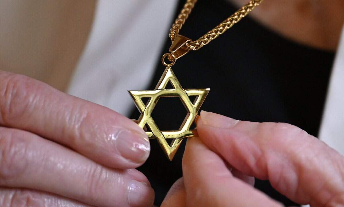 Janice Noga holds her Star of David as she talks about her upcoming last two performances of Janke during an interview Friday, Aug. 7, 2026 in Fresno.