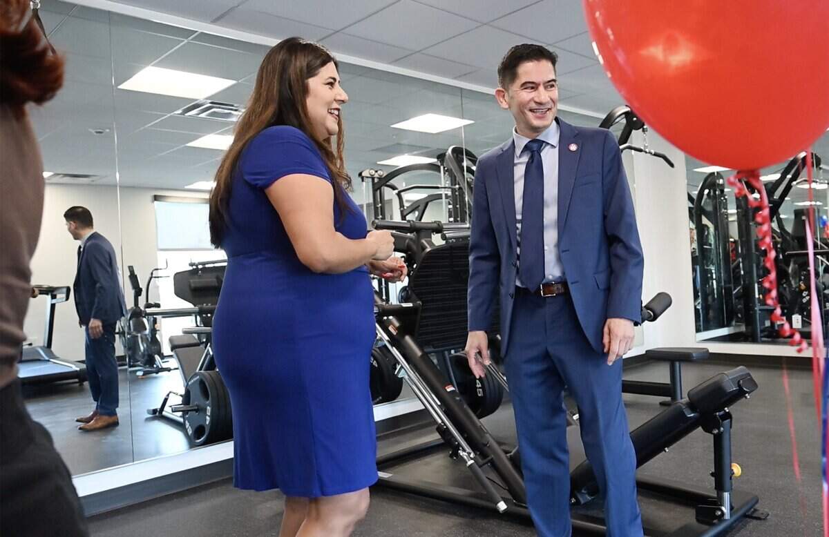 Fresno State president Dr. Saúl Jiménez-Sandoval, right, takes a look at the new gym on the first floor during a tour of Fresno State's new student housing Tuesday morning, Aug. 11, 2026 in Fresno.
