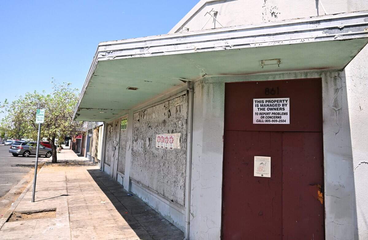 Boarded-up businesses are seen along Fern Avenue at the intersection with Maroa Avenue in the Tower District, photographed Thursday, Aug. 6, 2026 in Fresno.