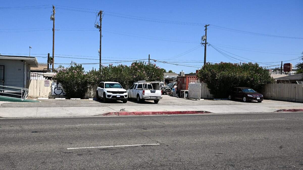 This is what remains of the parking lot beside Estrada's Spanish Kitchen, which was located at this location on North Blackstone Avenue at Grant Avenue near downtown Fresno. The building is now Saiz Construction & Development, which buys and manages/rents houses and does construction. Estrada's was there from 1928 to 1997. It was hugely popular.