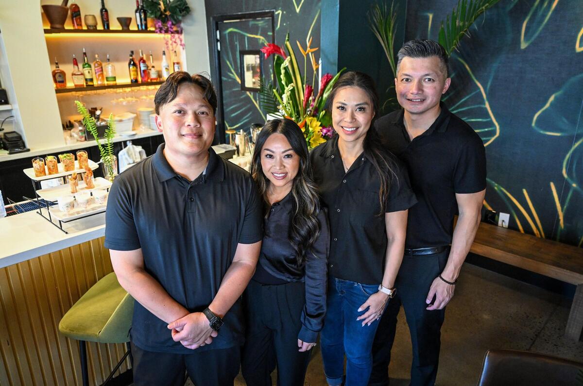 From left, Tito Thepkaysone, Sophorn So, Anna Nguyen, and David Rasavong, co-owners of Satay Thai Kitchen and Bar in north Fresno, pose for a photo during the grand opening of their restaurant on Thursday, May 8, 2025.