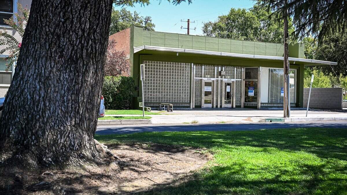 A building at 2026 N Van Ness near Fresno High appears to be in the process of becoming a cafe with a liquor license on Monday, Aug. 24, 2026. The neighborhood is known for its tree-lined streets, small business and walkabout traffic.