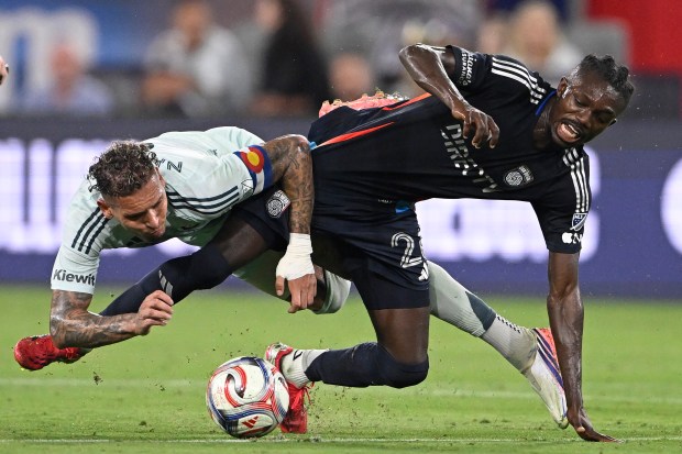 Rafael Navarro #9 of the Colorado Rapids and Manu Duah #26 of the San Diego FC fight for the ball during the second half at Snapdragon Stadium on August 22, 2026 in San Diego, California. (Photo by Denis Poroy/Getty Images)