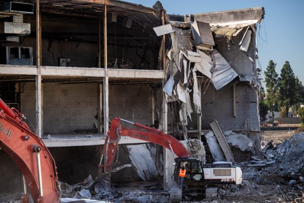Demolition in progress as heavy machinery takes on Carousel Mall in downtown San Bernardino on Friday, Oct. 20, 2023. (Photo by Watchara Phomicinda, The Press-Enterprise/SCNG)
