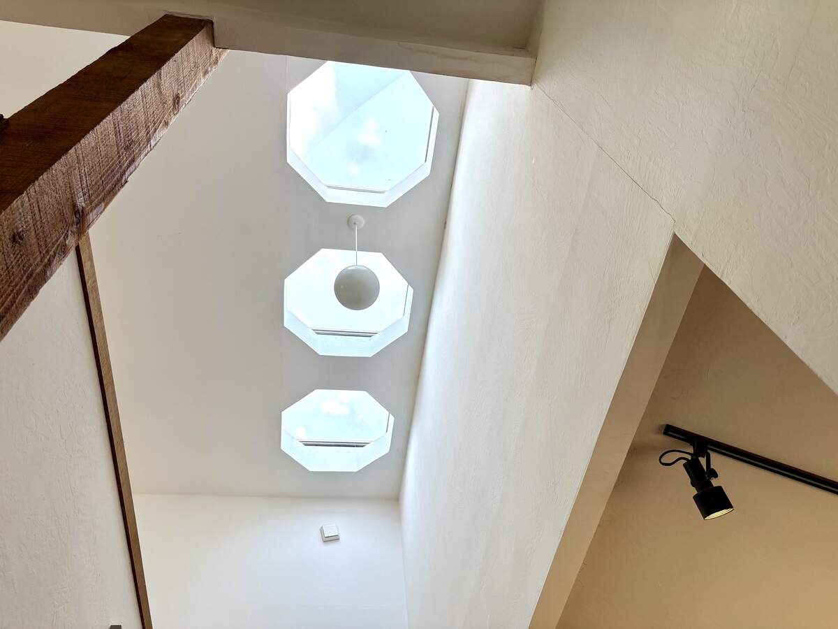 Octagon skylights bring natural light into the custom 1978 home