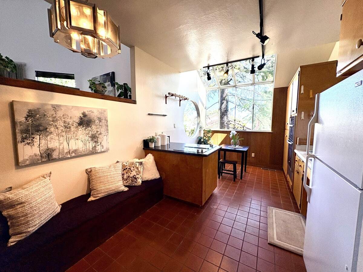Wood finishes and an original, late-1970s design define the kitchen, which the listing agent says is her favorite spot.