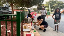 Volunteers helped with paint for Sunday's beautification art project in Mountain View Community Park, August 30, 2026.