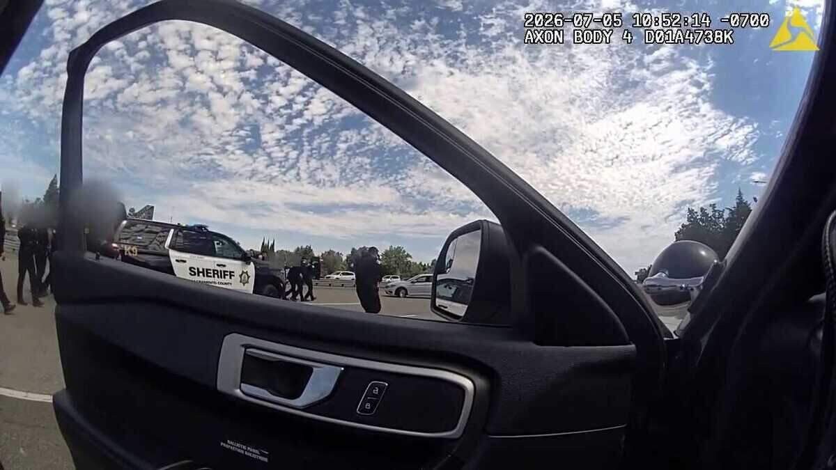 Sacramento County sheriff’s deputies approach the car of William Kreuzer after five deputies opened fire on him on Interstate 80 near Citrus Heights on July 5, 2026. Kreuzer, 38, was killed in the shooting.