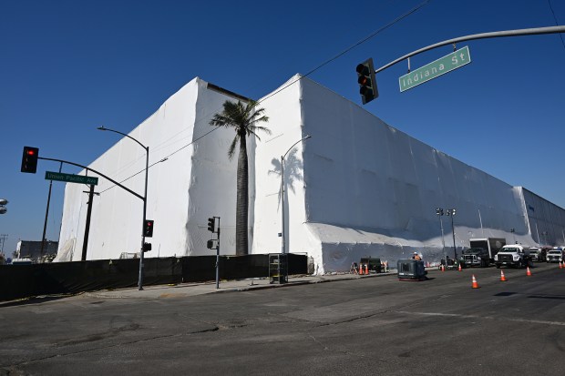 The Lineage warehouse appears to be wrapped in plastic. Residents of East L.A. and Boyle Heights held a press conference calling for the terminate shut down of Lineage on July 31, 2026 in Boyle Heights, CA. (Photo by John McCoy, Contributing Photographer)