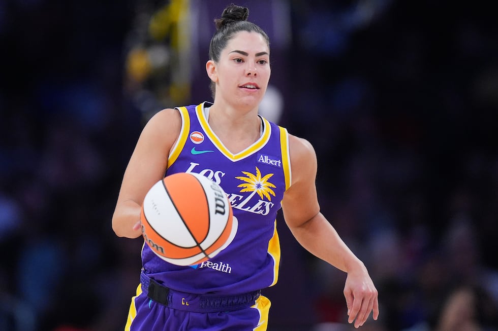 FILE - Los Angeles Sparks guard Kelsey Plum dribbles during the second half of a WNBA...