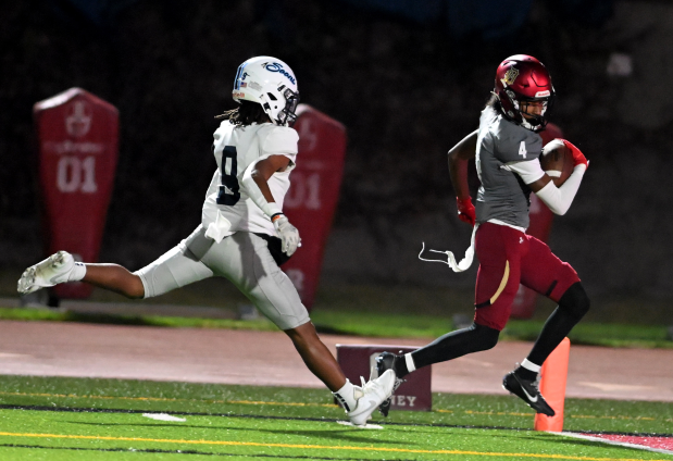 Damani Porras #4 of Downey runs for a touchdown against Jeromy Powell #9 of Mayfair in the first half of a prep football game at Downey High School in Downey on Friday, Nov. 1, 2024. (Photo by Libby Cline Birmingham, Contributing Photographer)