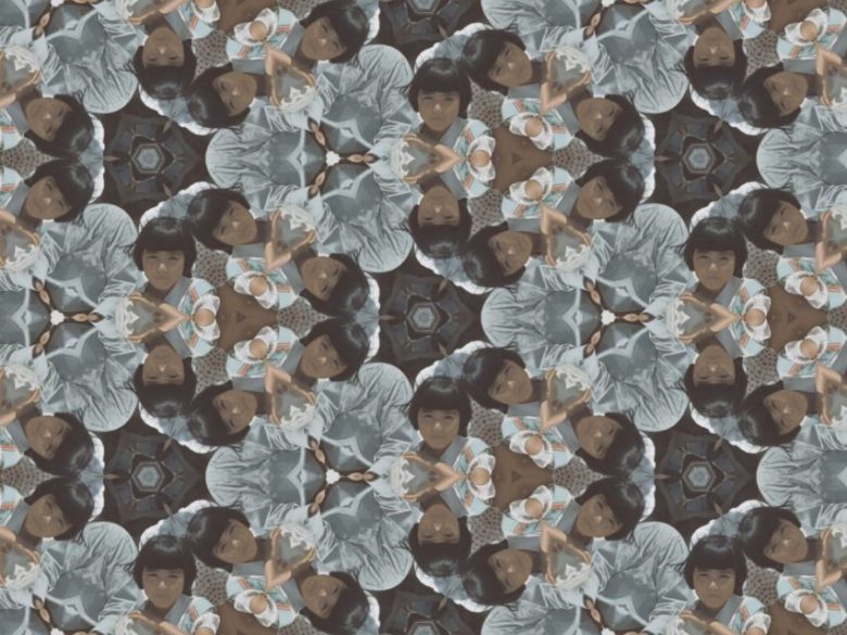 A kaleidoscopic pattern featuring repeated images of a young child with short dark hair, wearing a striped outfit, creating a symmetrical, geometric design.
