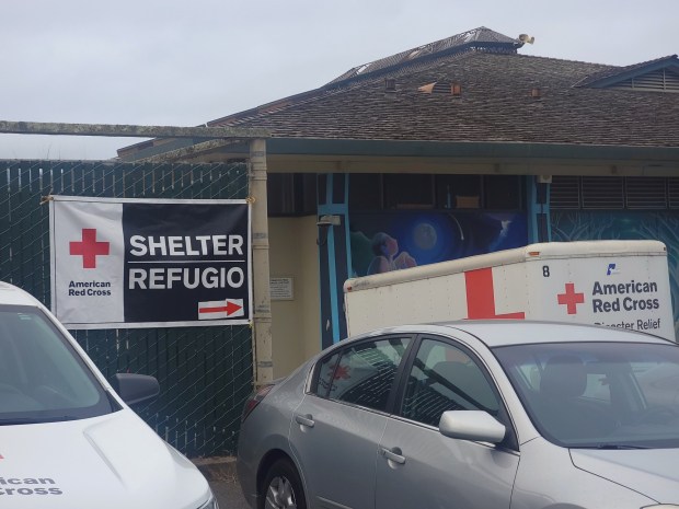 A shelter for residents fleeing the Timber Fire was opened at Carmel Middle School on Monday night. (Sean Tubo Monterey Herald)