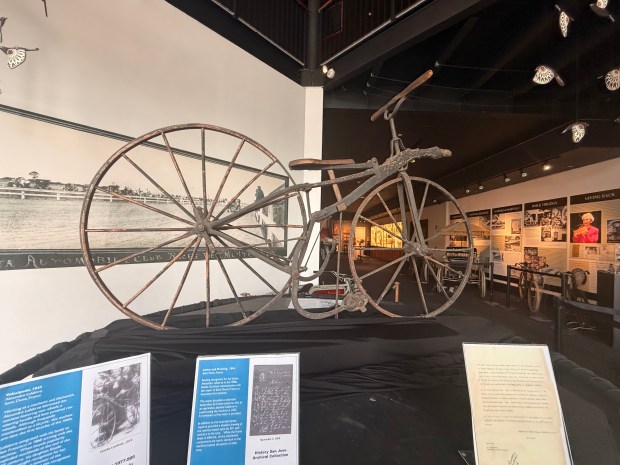 The exhibit included motorcycles, bicycles and other artifacts from the early days of motoring on the coast. One of the first bikes created was made of steel. (Photo by Kyarra Harris/Monterey Herald)