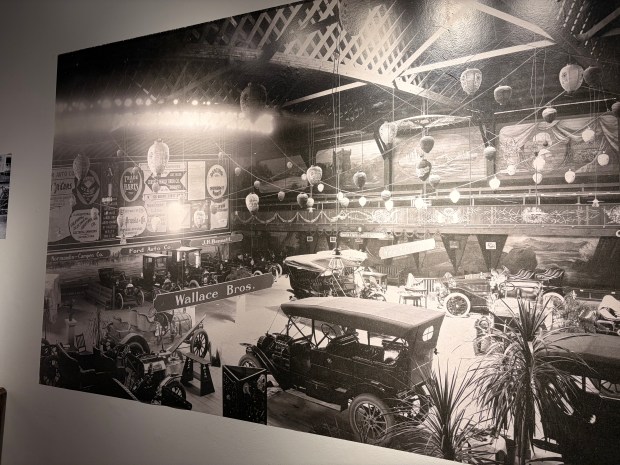 Images show off the first auto shows, early pictures of couples driving in the beach, and old infrastructure that still exists today. Curator Greg Berkin says these images depict life 100 years ago and you can often find similarities in body language. (Photo by Kyarra Harris/Monterey Herald)