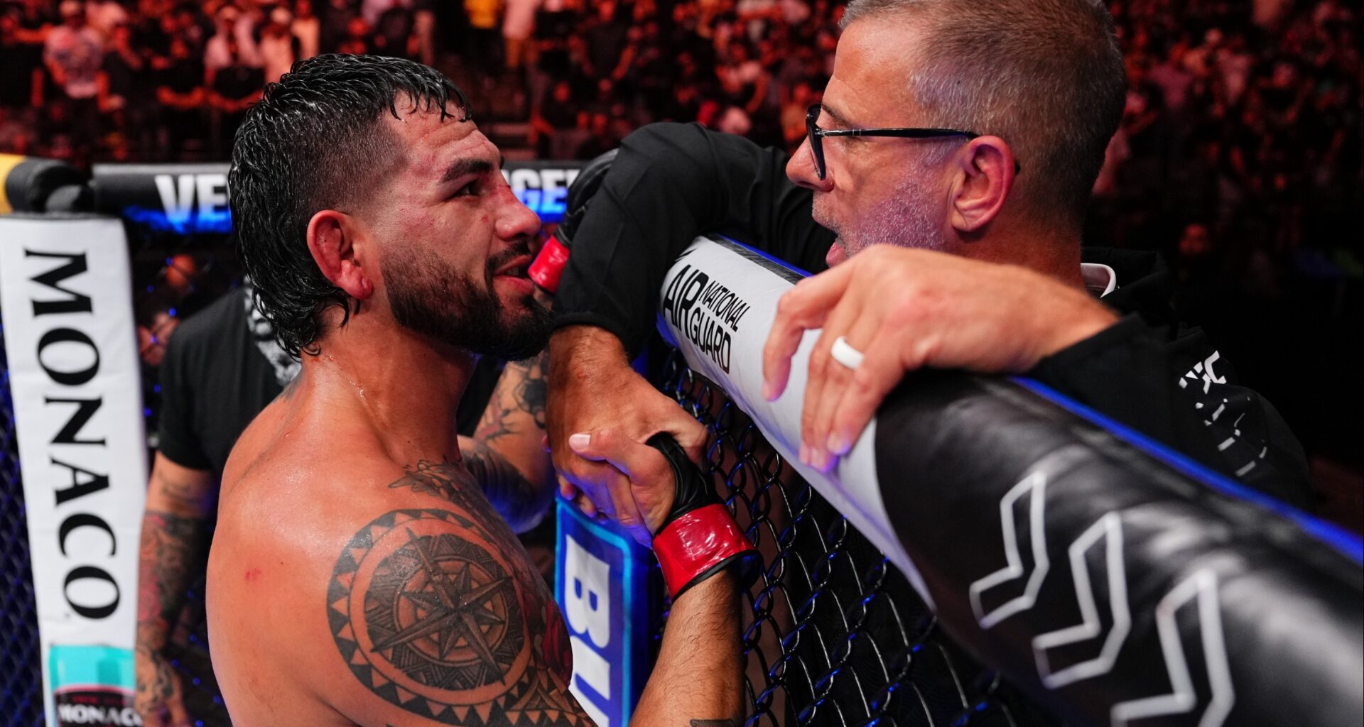 Anthony Hernandez speaks with Gregory Rodrigues' corner after UFC Sacramento