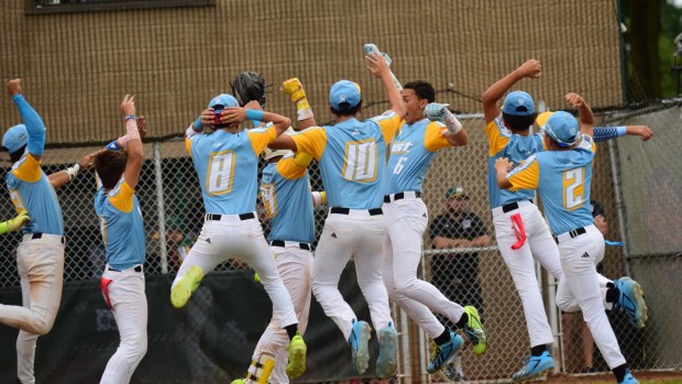 California players celebrate after Jerimiah Ortega (6) clubs a home run in the U.S. championship game vs Taylor North at the Juniot League Baseball World Series on Aug 15, 2026. (ALEXANDER MULLER -- MediaNews Group)