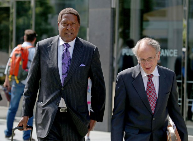 Civil rights attorneys John Burris, left, and Jim Chanin leave after a federal hearing at the Phillip Burton Federal Building and United States Courthouse in San Francisco, Calif., on Monday, July 10, 2017. (Jane Tyska/Bay Area News Group)