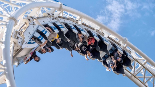 People ride the Revolution roller coaster at Six Flags Magic Mountain in Valencia. (Photo by Hans Gutknecht, Los Angeles Daily News/SCNG)