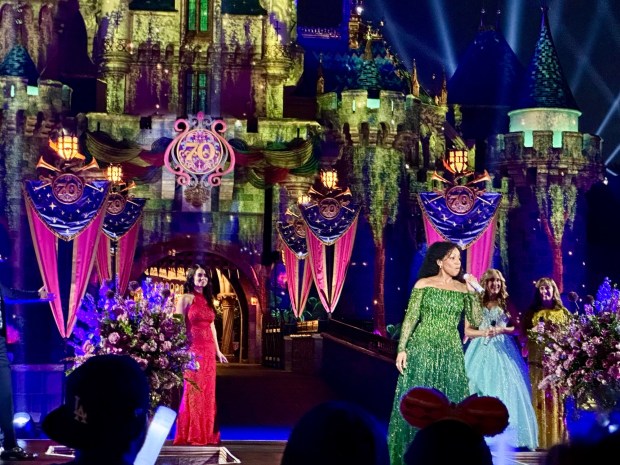 Anika Noni Rose (voice of Tiana in 2009's "The Princess and the Frog") performs during the Disney's World Princess Week concert in front of Sleeping Beauty Castle at Disneyland. (Brady MacDonald/SCNG/Orange County Register)