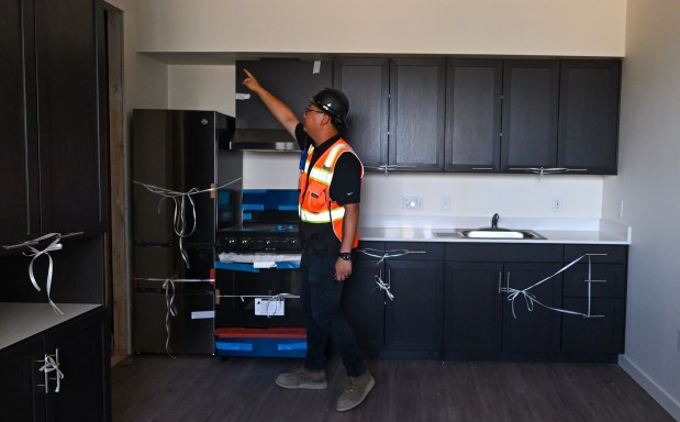 Assistant project manager Chris Pan, in an apartment of prefabricated 65-unit apartment complex in Midway City on Thursday, August 27, 2026. (Photo by Jeff Gritchen, Orange County Register/SCNG)