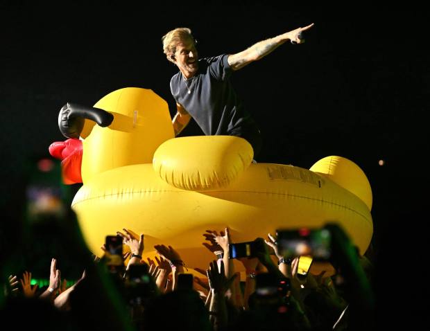Andrew McMahon is carried by the audience on a giant rubber duck during the Three Pianos tour, August 22, 2026, at the new F&M Bank Amphitheater of Long Beach. (Photo by Steven Georges, Contributing Photographer)