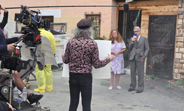 Screenwriter Costa Dillon took this photo of "Attack of the Killer Tomatoes: Organic Intelligence" actors Karly Rothenberg and Eric Roberts when they were filming in Chula Vista. The film was released on Aug. 7. (Costa Dillon)