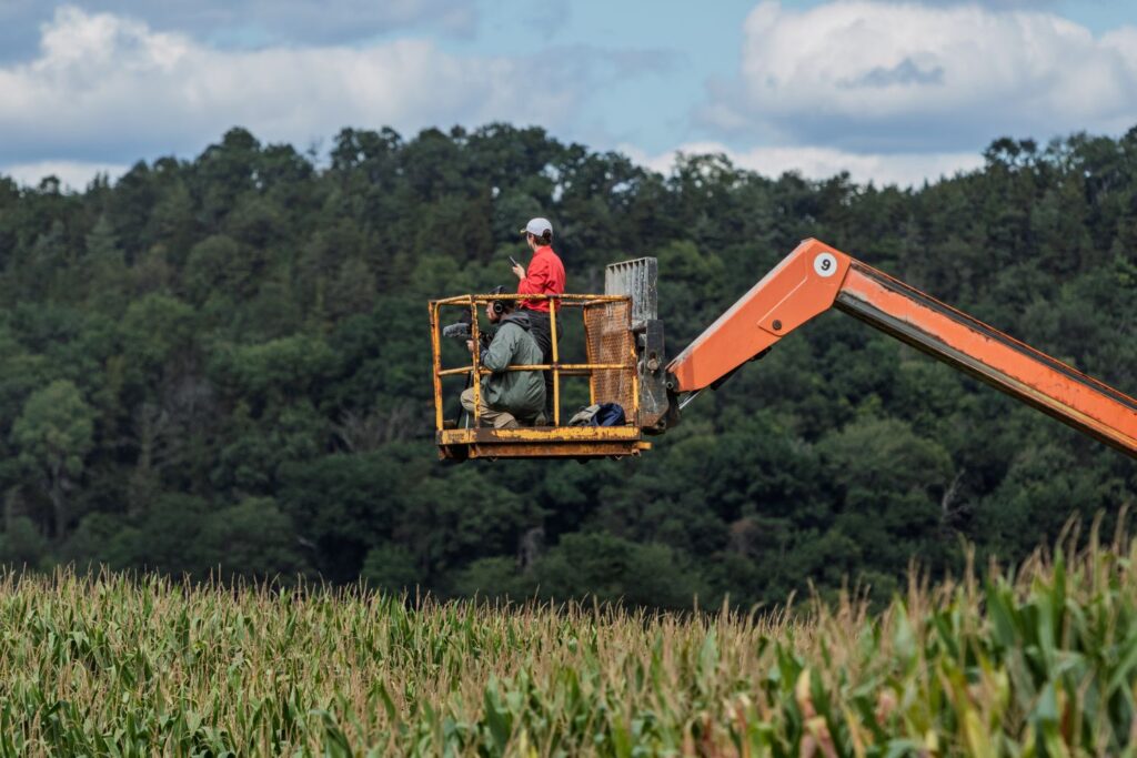 "Hay Rake Ballet" - Sarah Gordon Butler directing farmers - Photo by Ron Lutz II.