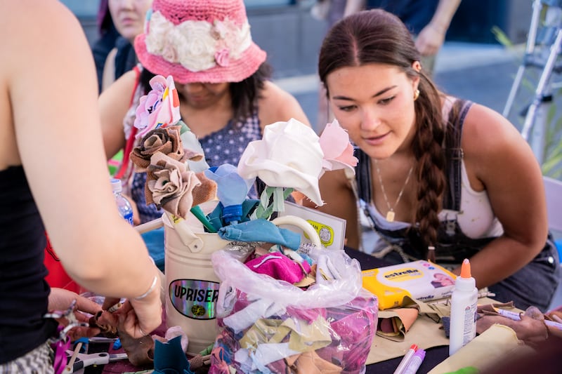 Los Angeles streetwear brand Uprisers collaborates with Little Tokyo Florists for a workshop booth. It invites attendees to hand-make flowers from glue and discarded fabrics.