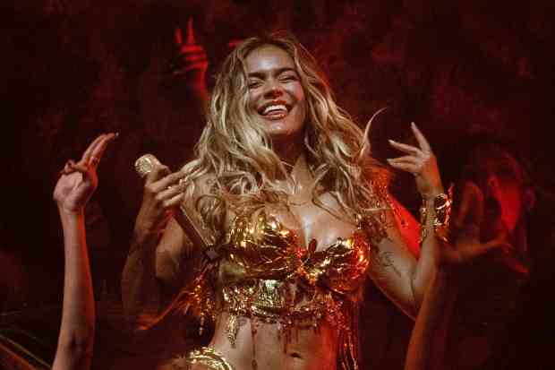 Karol G smiles during her performance on the main stage of the Coachella Valley Music & Arts Festival in Indio on Sunday, April 19, 2026. (Photo by Drew A. Kelley, Press-Telegram/SCNG)