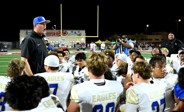 Santa Margarita head coach Carson Palmer talks with his team after defeating Centennial 21-20 to win the nonleague football game in Corona on Friday, Aug. 28, 2026. (Photo by Terry Pierson, The Press-Enterprise/SCNG)