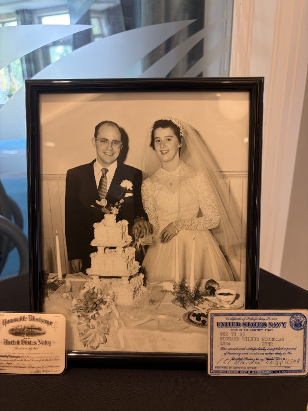 A wedding photo of Richard "Dick" Nicholas and his wife, Mary, displayed during his 102nd birthday party. Mary died in 2017. (MALLORY WALIGORA, FOR THE OAKLAND PRESS)