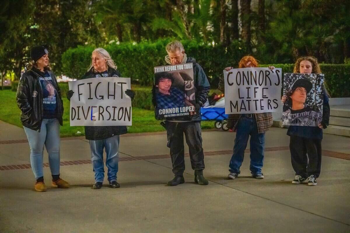 Family members of Conor Lopez — from left, cousin Bayley Jones; grandmother Christine Clinkenbeard; grandfather John LeMieux; and sisters Ava, 11, and Julia Lyman, 12 — hold signs on the World Day of Remembrance for Road Traffic Victims at the state Capitol on Nov. 16. Lopez died in April 2025 while riding his motorcycle in Elk Grove, going straight when a car turned into him.