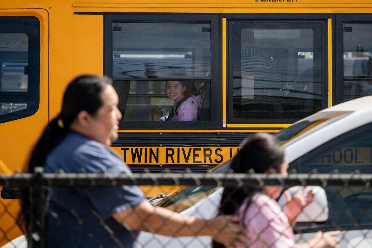 A student sits on a Twin Rivers Unified school bus at D.W. Babcock Elementary School in Sacramento on Friday.