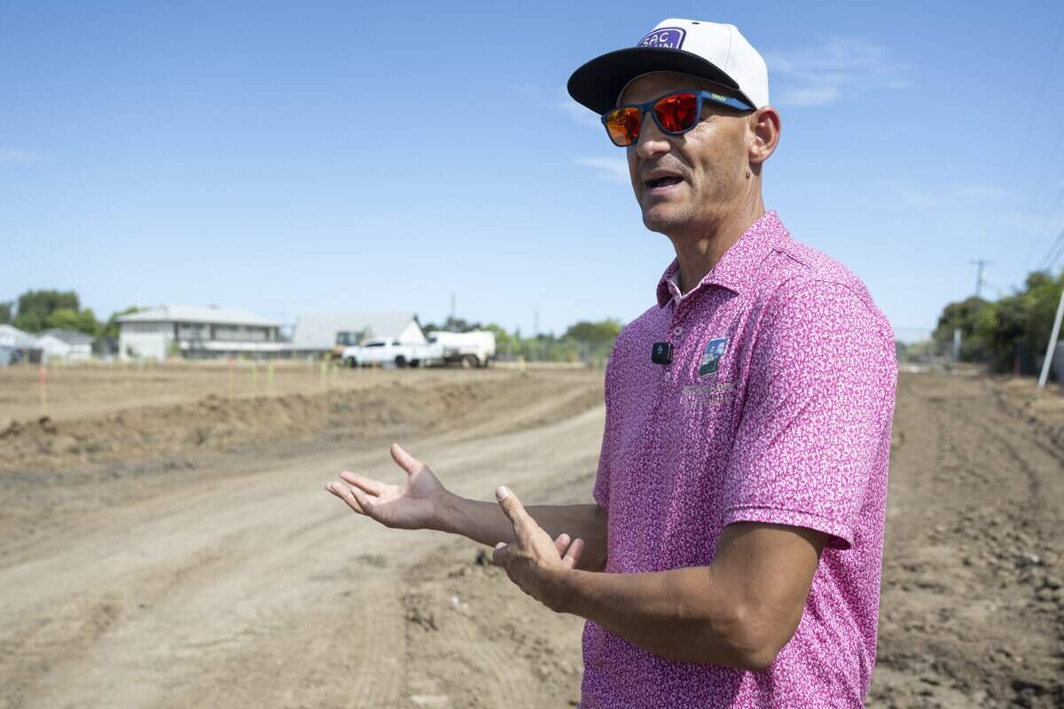 Sacramento Mayor Kevin McCarty gives a tour of the future Gardendale Road micro-community in Sacramento on Thursday. The site will feature 30 tiny homes for homeless seniors.
