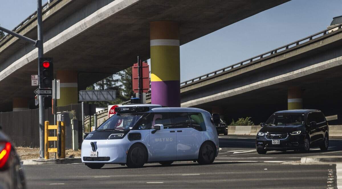 A Waymo vehicle exits Interstate 5 at J Street in downtown Sacramento during a test on city freeways on Thursday, Aug. 13, 2026.