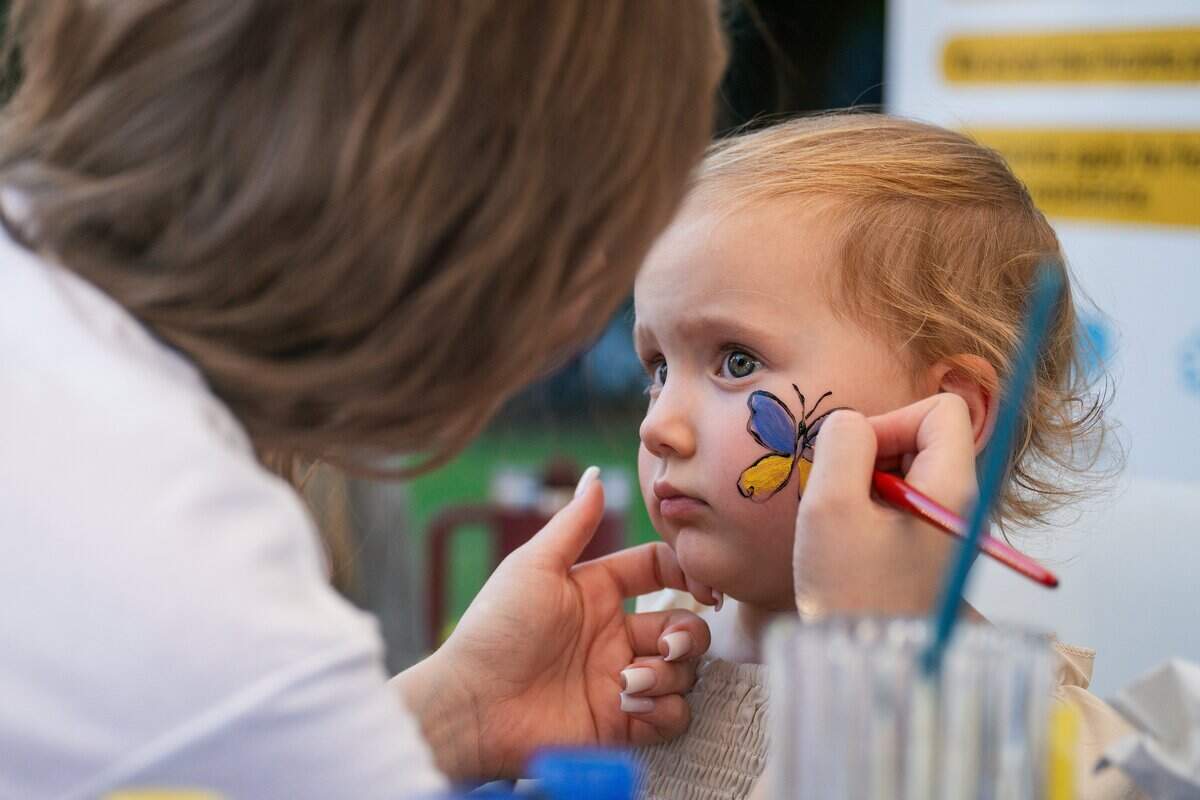 A child gets a face painting during an event marking the 35th anniversary of Ukrainian independence at the California Capitol last week.