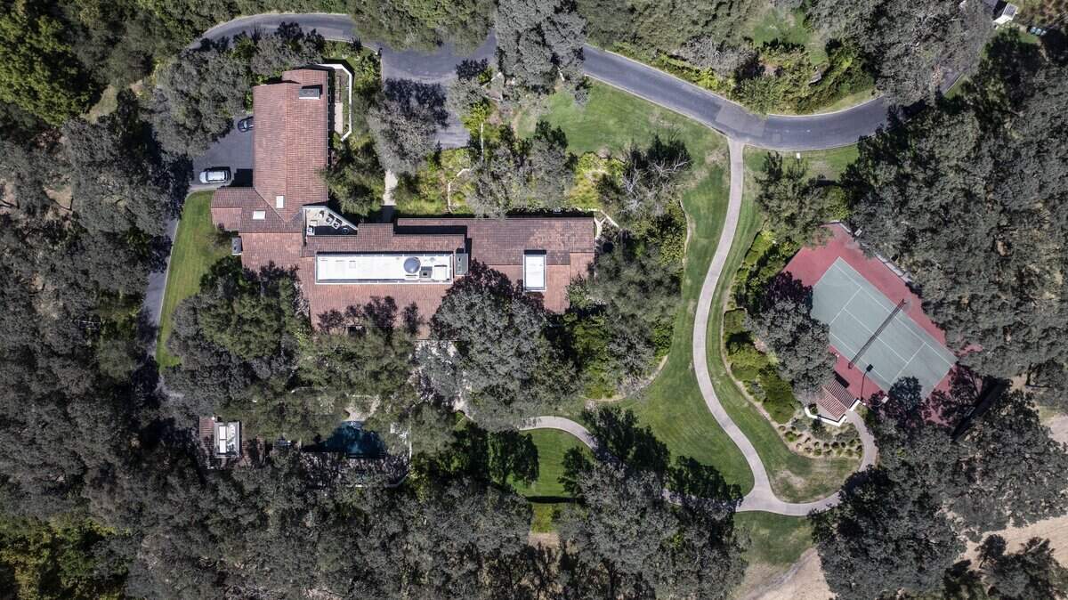 The gated Fair Oaks residence at 7640 Tobia Way, listed on Monday, Aug. 24, 2026, by Gov. Gavin Newsom and First Partner Jennifer Siebel Newsom for $7.5 million, sits on 8.2 acres along the bluffs near the American River and includes a roughly 12,663-square-foot residence.