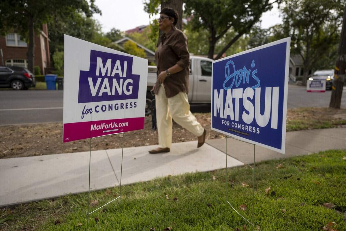 Campaign signs for Congressional District 7 candidates Doris Matsui and Mai Vang stand outside the Coloma Community Center in Sacramento on Thursday, Aug. 27, 2026.