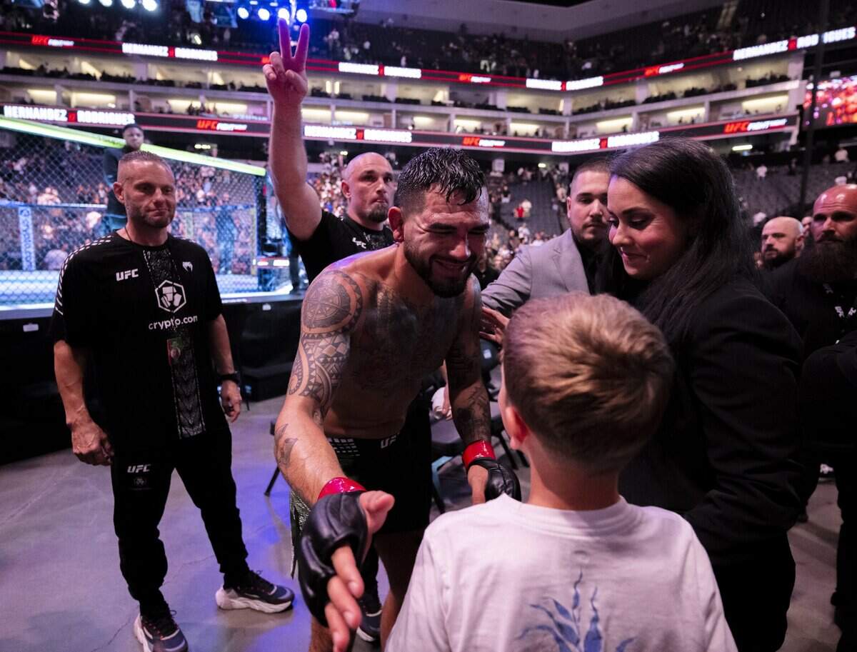 Middleweight Anthony Hernandez signs an autograph following his fight against Gregory Rodrigues in the main event Saturday, Aug. 22, 2026, at Golden 1 Center in Sacramento.