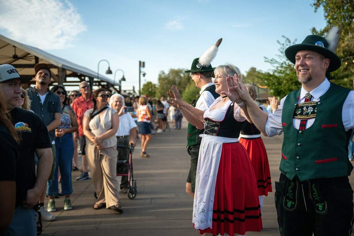 Members of the Sacramento Turn Verein Alpentanzer Schuhplattler dance group perform at the opening of Der Biergarten Waterfront in Old Sacramento on Friday.