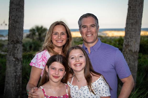 Peter Alexander appears with his family -- wife, Alison Starling, a local TV journalist, and daughters, Ava and Emma. (Courtesy of MS NOW).